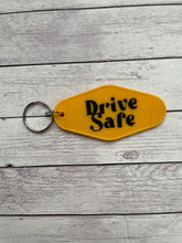 Load image into Gallery viewer, Motel Keychain - Drive Safe
